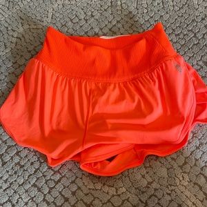 BARELY WORN NEON ORANGE FP MOVEMENT SHORTS!!